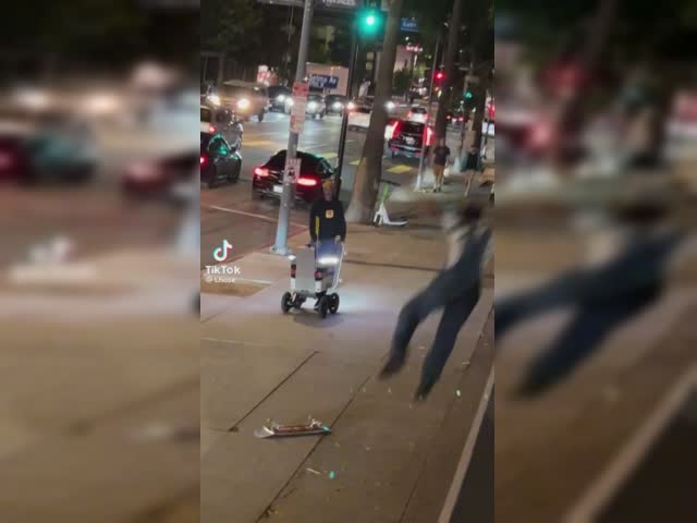 Junkies knocking down Pizza Hut delivery robot